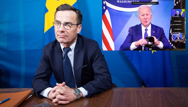 Prime Minister Ulf Kristersson with President Joe Biden on screen at a digital meeting
