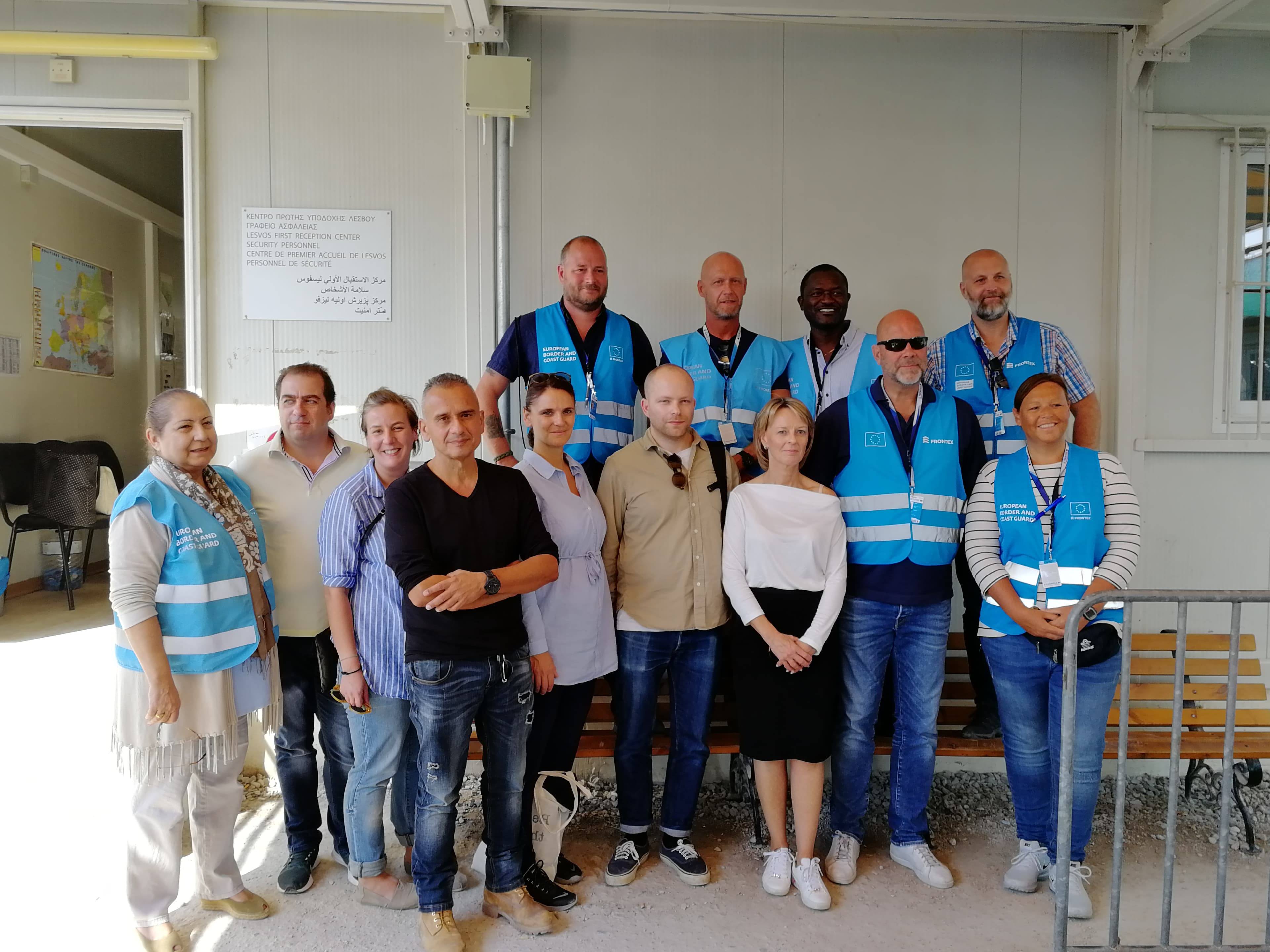 Ambassador Sammelin together with the Swedish delegation, Frontex-staff and deputy head of camp Dimitris Vafeas.