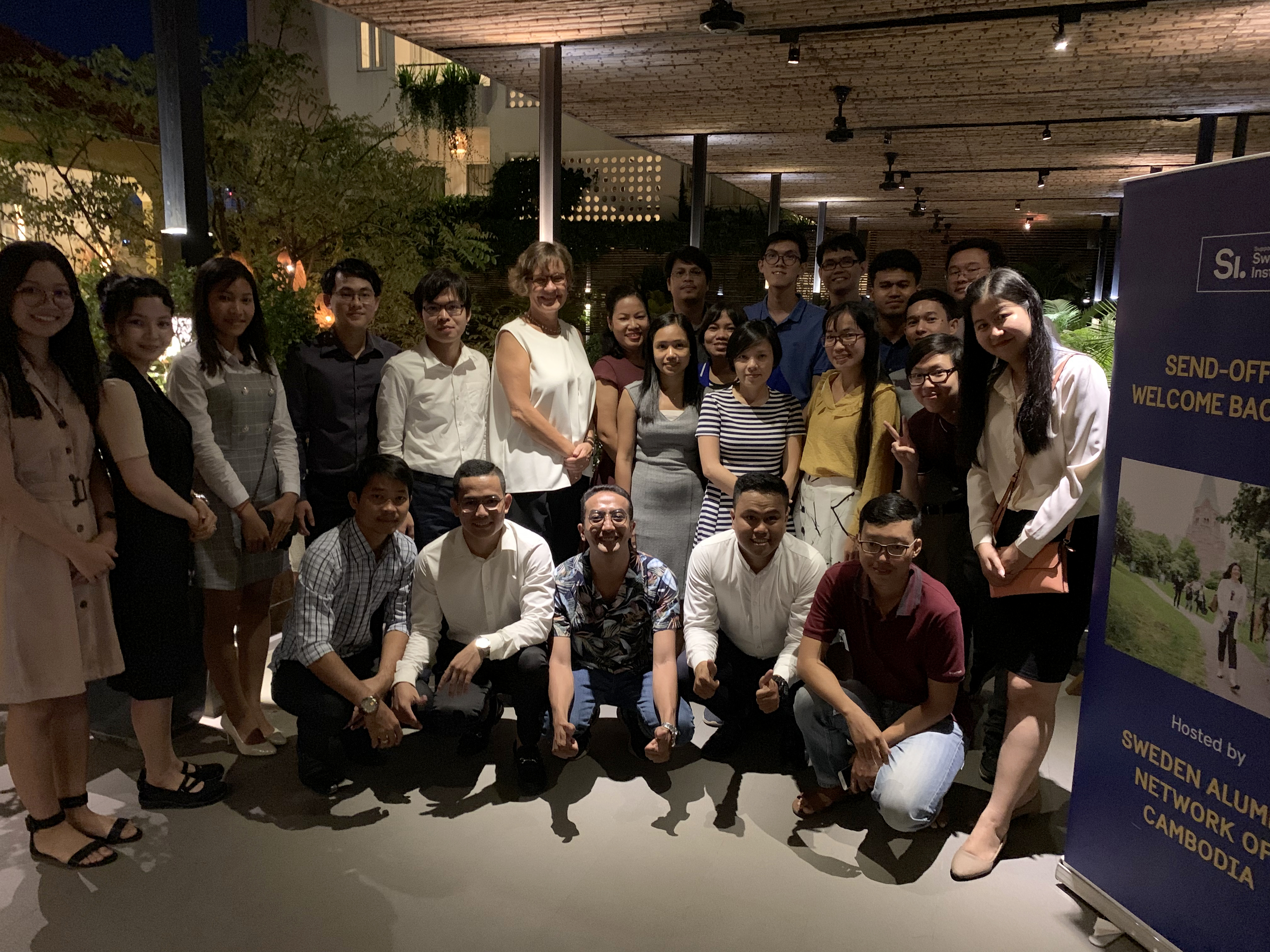 Group photo during the sent-off and welcome back event