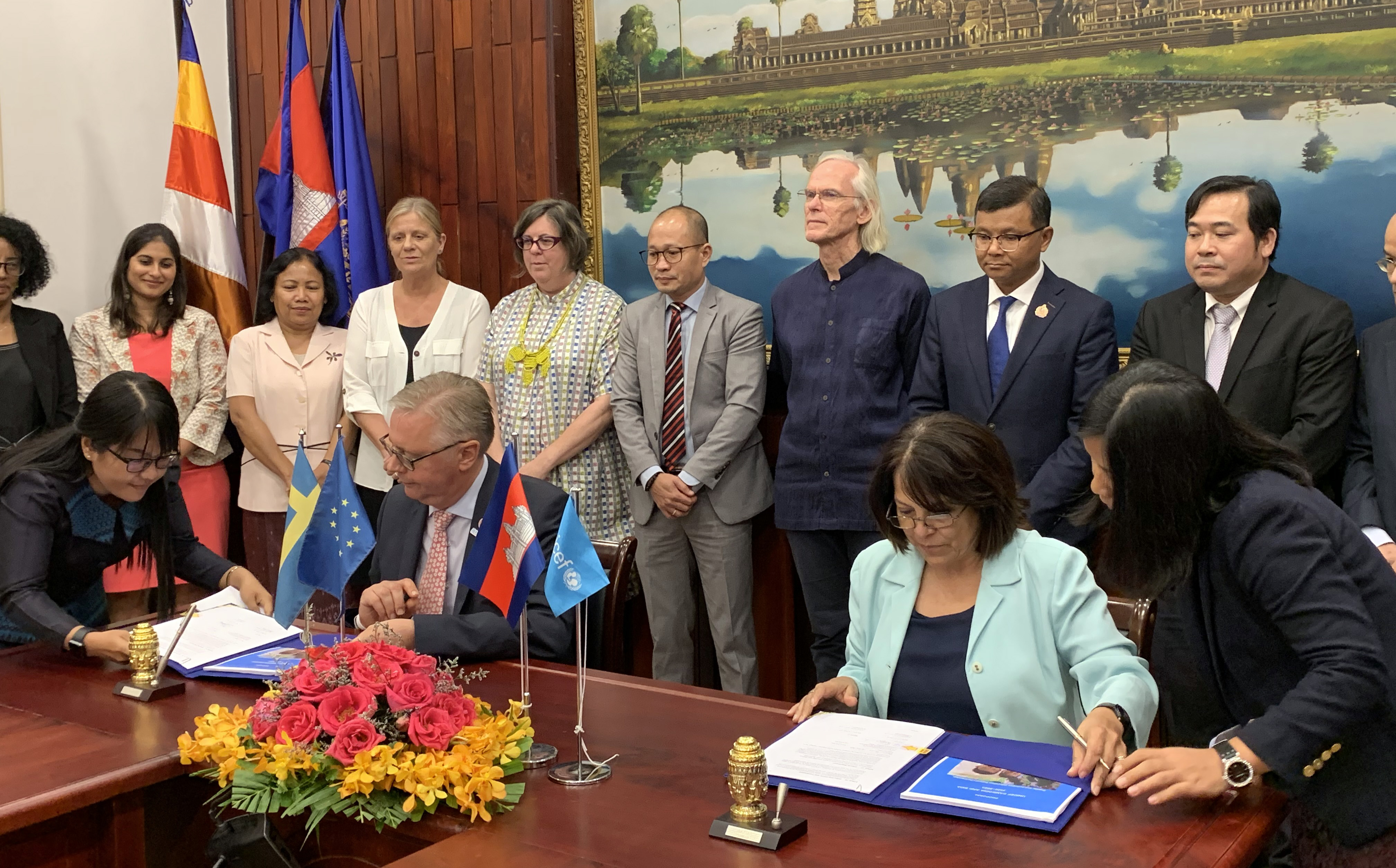 Ambassador Björn Häggmark (left) signed agreement with UNICEF’s Representative Ms. Cristian Munduate (right)at the Ministry of Education, Youth and Sport.